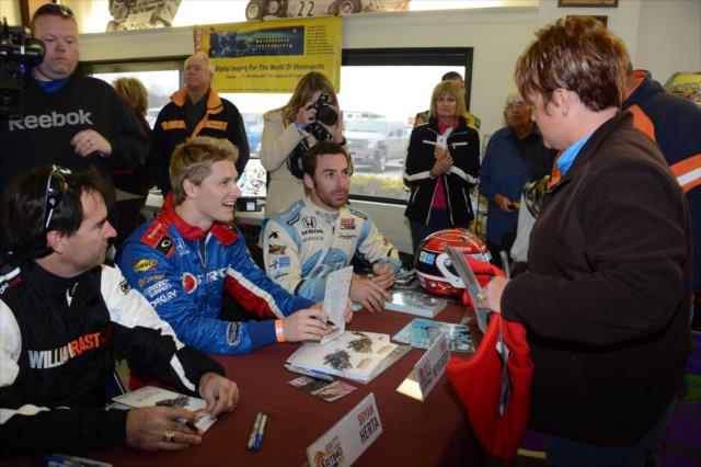 Bryan Herta, Josef Newgarden, and Simon Pagenaud sign autographs at the Dan Wheldon Pro-Am Karting Classic -- Photo by: Chris Owens