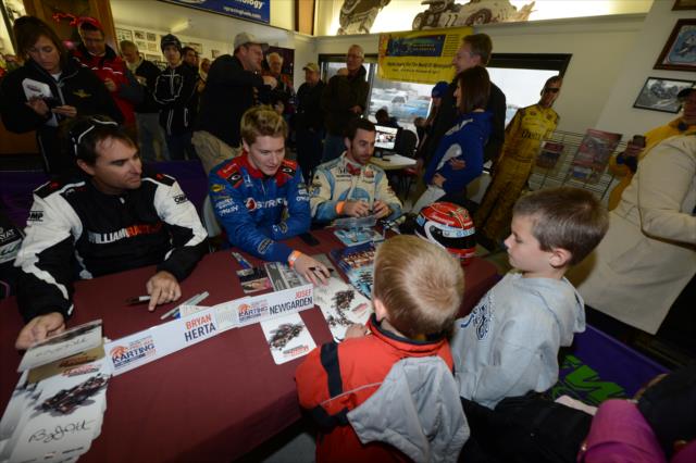 Bryan Herta, Josef Newgarden, and Simon Pagenaud sign autographs for some young fans at the Dan Wheldon Pro-Am Karting Classic -- Photo by: Chris Owens