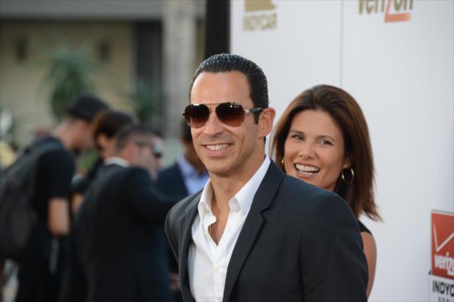 Helio Castroneves and Adriana Henao walk the red carpet during the 2014 INDYCAR Championship Celebration -- Photo by: Chris Owens