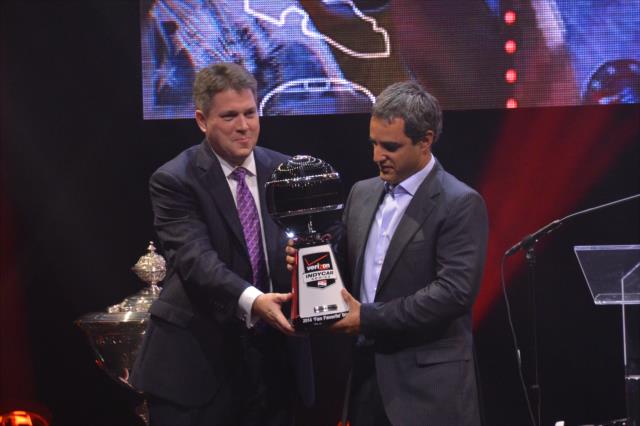 Juan Pablo Montoya is presented the 2014 Fan Favorite Award during the 2014 INDYCAR Championship Celebration -- Photo by: Chris Owens