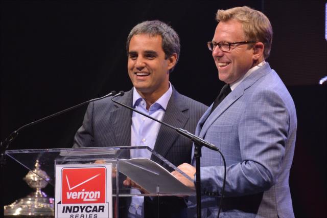 Emcee Leigh Diffey and Juan Pablo Montoya at the podium during the 2014 INDYCAR Championship Celebration -- Photo by: Chris Owens