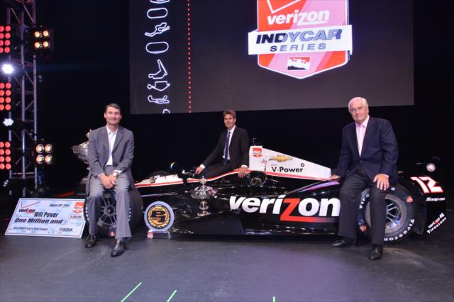 Will Power, Tim Cindric, and Roger Penske with the championship car following the 2014 INDYCAR Championship Celebration -- Photo by: Chris Owens