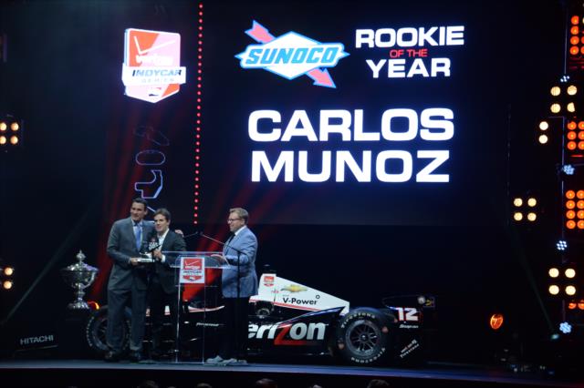 Carlos Munoz is presented the 2014 Sunoco Rookie of the Year Award at the 2014 INDYCAR Championship Celebration -- Photo by: John Cote