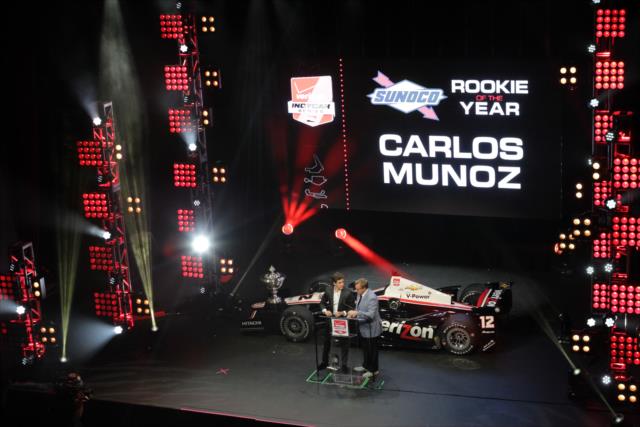 Carlos Munoz receives the 2014 Verizon IndyCar Series Rookie of the Year Award at the 2014 INDYCAR Championship Celebration -- Photo by: Joe Skibinski