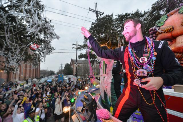 James Hinchcliffe waives to the Mardi Gras crowd during the Krewe of Bacchus parade in New Orleans -- Photo by: Chris Owens
