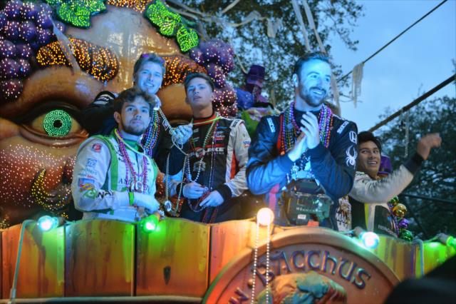Carlos Munoz, Josef Newgarden, Aaron Telitz, James Hinchcliffe, and Neil Alberico aboard one of the Krewe of Bacchus Mardi Gras floats in New Orleans -- Photo by: Chris Owens