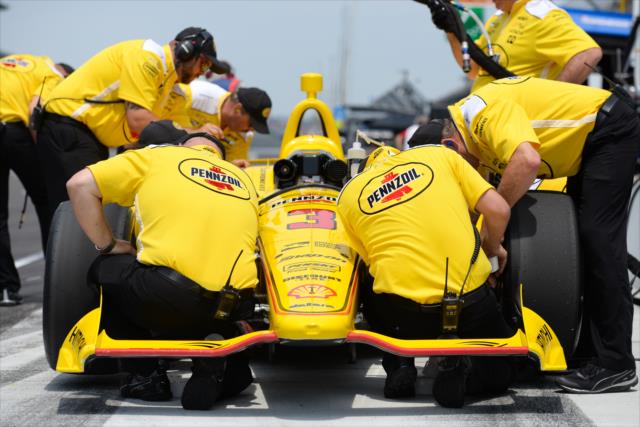 Team Penske go over the No. 3 Pennzoil Chevrolet of Helio Castroneves on pit lane prior to his qualification attempt for the 102nd Indianapolis 500 at the Indianapolis Motor Speedway -- Photo by: James  Black