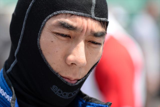 Takuma Sato in deep thought along pit lane prior to his qualification attempt for the 102nd Indianapolis 500 at the Indianapolis Motor Speedway -- Photo by: James  Black