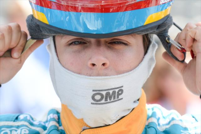 Gabby Chaves slides on his helmet prior to his qualification attempt for the 102nd Indianapolis 500 at the Indianapolis Motor Speedway -- Photo by: James  Black
