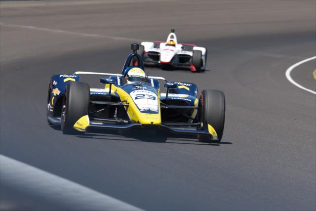 Charlie Kimball and Oriol Servia exit Turn 1 during the final practice for the 102nd Indianapolis 500 on Miller Lite Carb Day at the Indianapolis Motor Speedway -- Photo by: James  Black