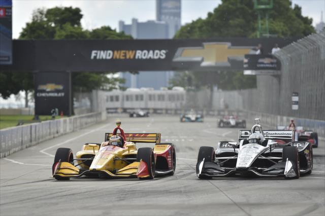 Ryan Hunter-Reay and Simon Pagenaud go wheel-to-wheel into Turn 1 during Race 2 of the Chevrolet Detroit Grand Prix at Belle Isle Park -- Photo by: Chris Owens