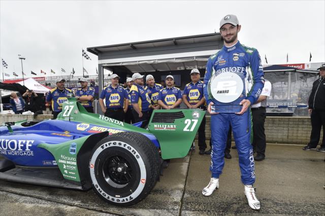 Alexander Rossi with the Verizon P1 Award after winning the pole position for Race 2 of the Chevrolet Detroit Grand Prix at Belle Isle Park -- Photo by: Chris Owens