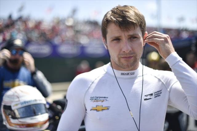 Jordan King sets his earpieces along pit lane prior to the start of Race 2 of the Chevrolet Detroit Grand Prix at Belle Isle Park -- Photo by: Chris Owens