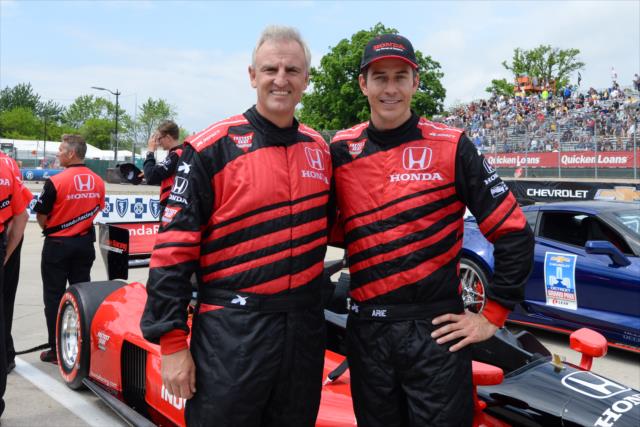 ESPN's Trey Wingo and Arie Luyendyk Jr. pose prior to their two-seater ride during pre-race festivities for Race 2 of the Chevrolet Detroit Grand Prix at Belle Isle Park -- Photo by: James  Black