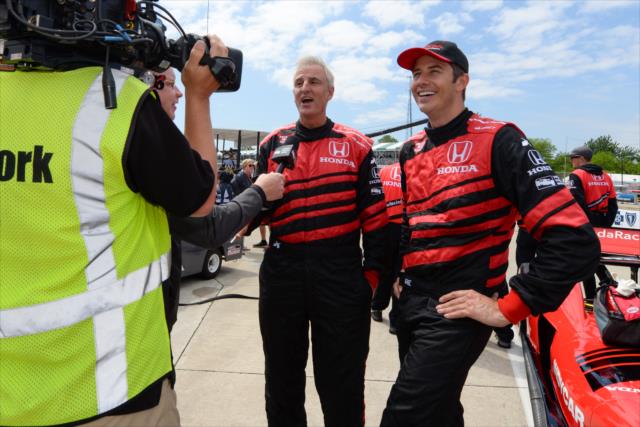 ESPN's Trey Wingo and Arie Luyendyk Jr. are interviewed by the media prior to their two-seater rider around the streets of Belle Isle Park -- Photo by: James  Black
