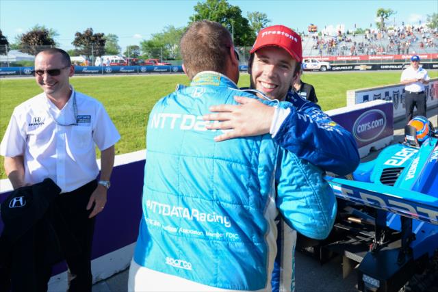 Ed Jones is congratulated by his team on pit lane after his 3rd place finish in Race 2 of the Chevrolet Detroit Grand Prix at Belle Isle Park -- Photo by: James  Black