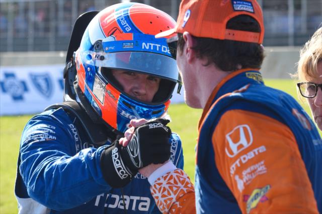 Ed Jones gets a congratulatory handshake from teammate Scott Dixon on pit lane after his 3rd Place finish in Race 2 of the Chevrolet Detroit Grand Prix at Belle Isle Park -- Photo by: James  Black