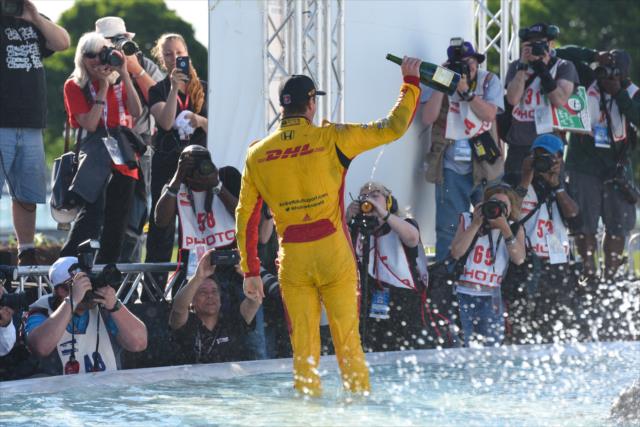 Ryan Hunter-Reay toasts the gathered photographers in the James Scott Memorial Fountain at Belle Isle Park in Detroit -- Photo by: James  Black