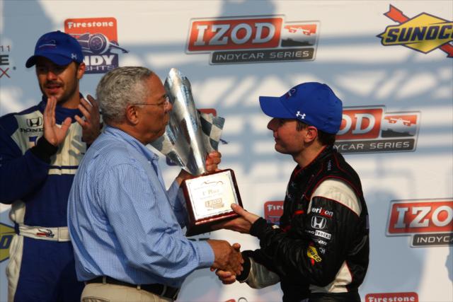Will Power accepting the 1st place trophy from Colin Powell -- Photo by: Chris Jones