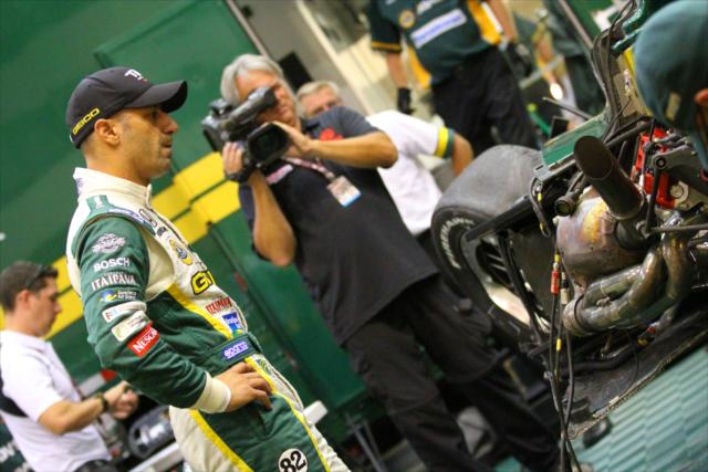 Tony Kanaan checks out his damaged car -- Photo by: Shawn Gritzmacher