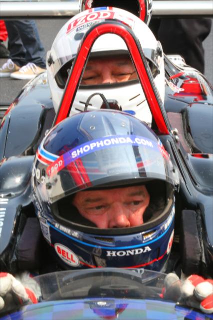 Colin Powell straps into the two-seater with Al Unser Jr at the wheel -- Photo by: Shawn Gritzmacher