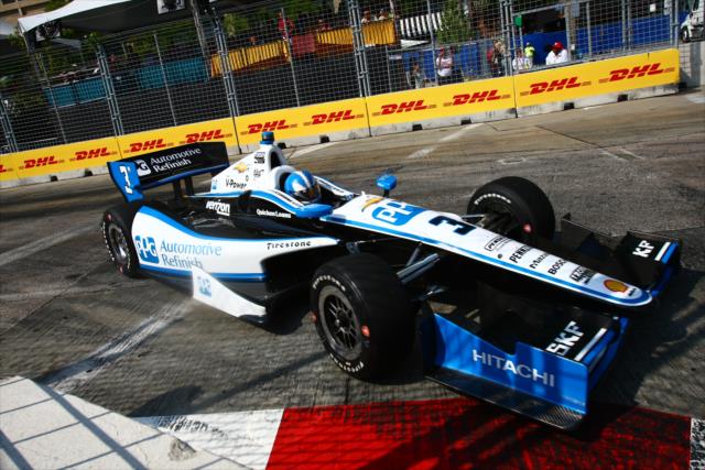 Helio Castroneves dives into Turn 1 during the Grand Prix of Baltimore -- Photo by: Bret Kelley