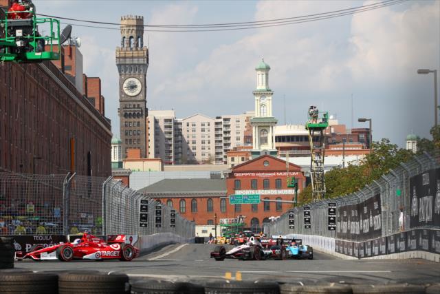 Scott Dixon leads Will Power and the rest of the field during the opening stages of the Grand Prix of Baltimore -- Photo by: Chris Jones