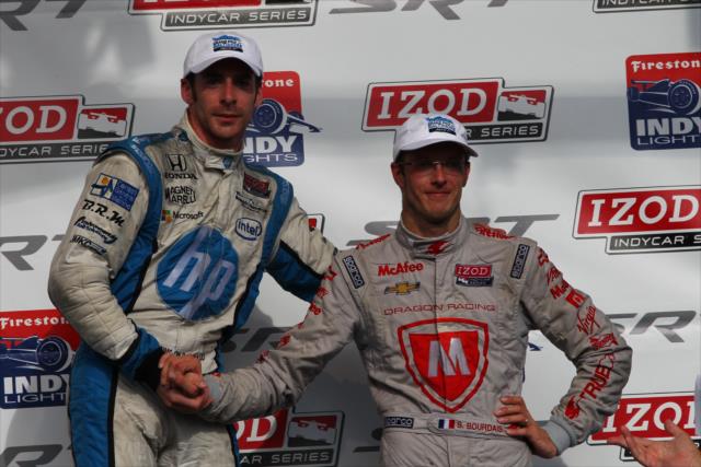 Frenchmen Simon Pagenaud and Sebastien Bourdais congratulate each other after their podium finishes -- Photo by: Chris Jones