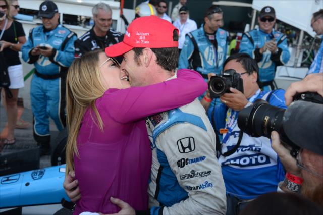 Simon Pagenaud recieves a victory kiss from his girlfriend after winning the 2013 Grand Prix of Baltimore -- Photo by: Chris Owens