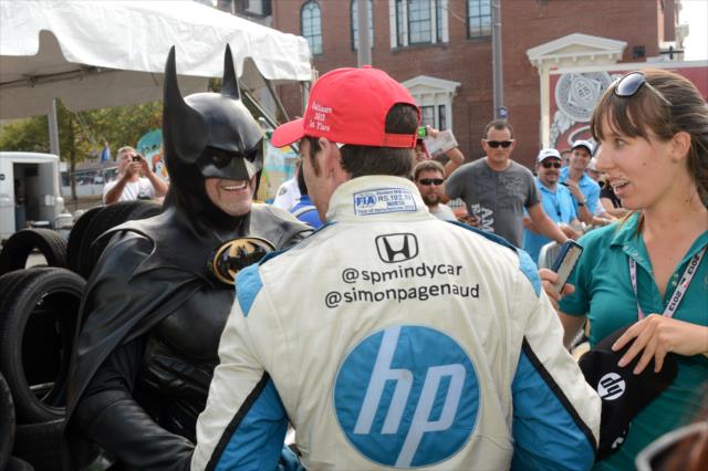 Simon Pagenaud is congratulated by Batman after winning the 2013 Grand Prix of Baltimore -- Photo by: Chris Owens