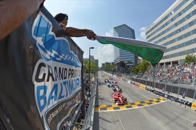 The green flag flies to start the 2013 Grand Prix of Baltimore -- Photo by: John Cote