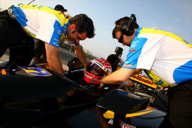 Simon Pagenaud gets belted in. -- Photo by: Dan Helrigel