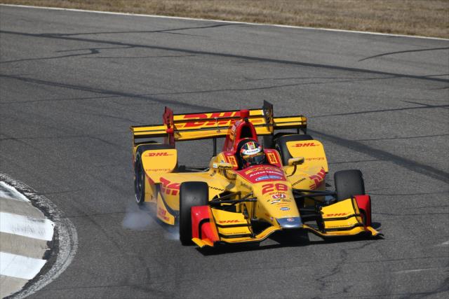Ryan Hunter-Reay locks up his tires in the Turn 8-9 Esses during the open test at Barber Motorsports Park -- Photo by: Chris Jones