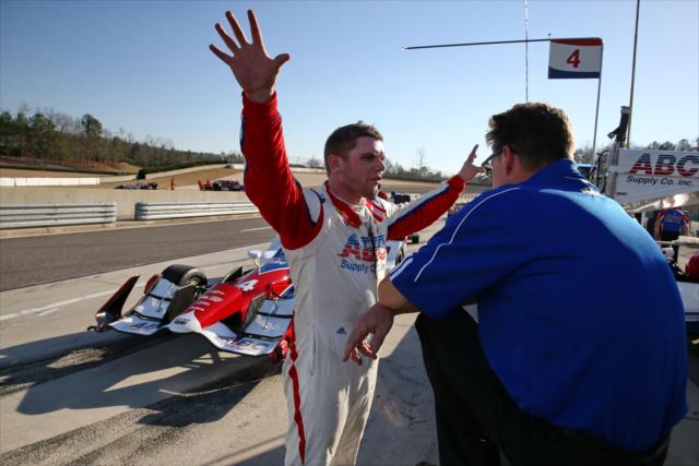 Conor Daly chats with one of his engineers on pit lane during the open test at Barber Motorsports Park -- Photo by: Chris Jones