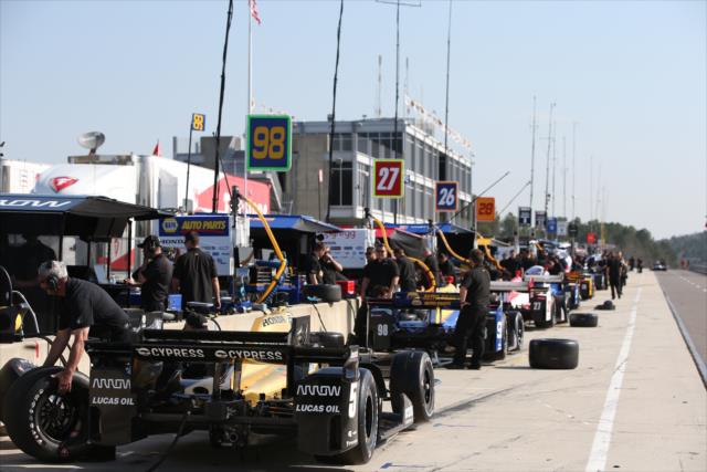 Pit lane comes to life prior to track activity during the open test at Barber Motorsports Park -- Photo by: Chris Jones