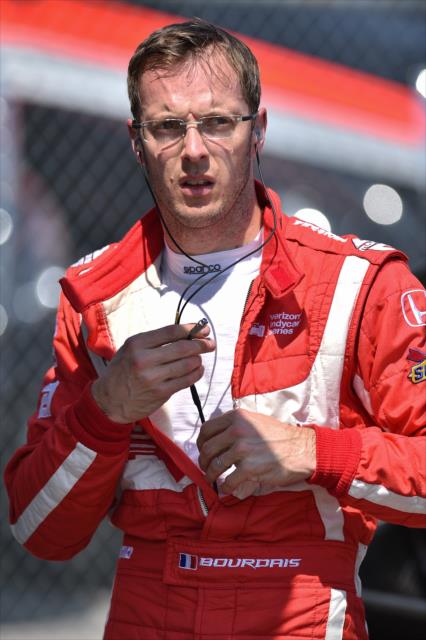 Sebastien Bourdais walks pit lane prior to track activity during the open test at Barber Motorsports Park -- Photo by: Chris Owens
