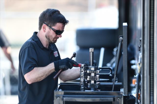 A Schmidt Peterson Motorsports engineer prepares a gear stack back in the paddock during the open test at Barber Motorsports Park -- Photo by: Chris Owens