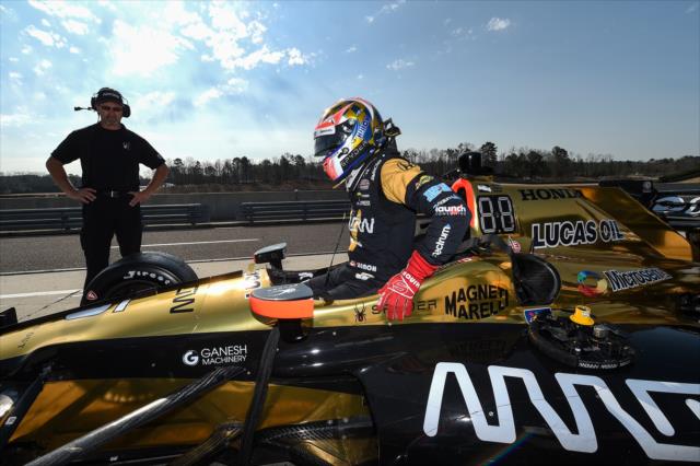 James Hinchcliffe slides into his No. 5 Arrow Honda on pit lane prior to track activity during the open test at Barber Motorsports Park -- Photo by: Chris Owens