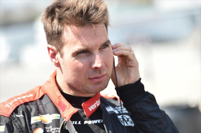 Will Power adjusts his earpiece on pit lane prior to track activity for the open test at Barber Motorsports Park -- Photo by: Chris Owens