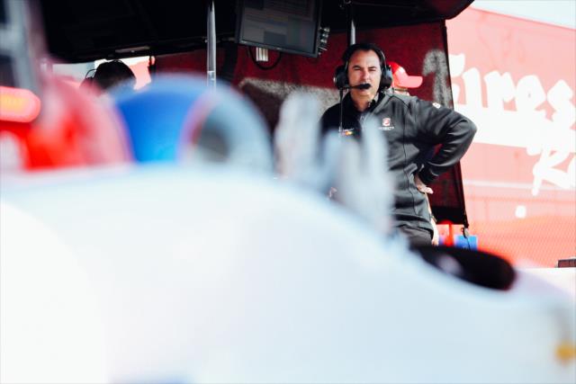 Bryan Herta watches over Marco Andretti on pit lane as he is getting ready to be on track during the open testing at Barber Motorsports Park. -- Photo by: Joe Skibinski