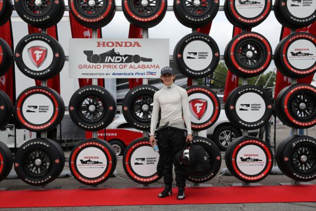 Zach Veach poses for a photograph in the Firestone Fan Village at Barber Motorsports Park -- Photo by: Chris Jones