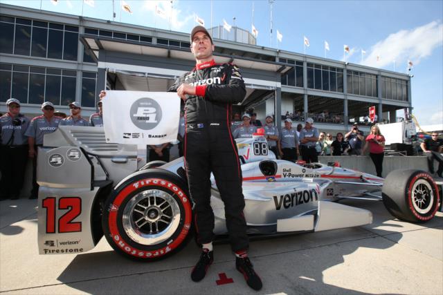 Will Power withthe Verizon P1 Award flag for winning the pole position for the Honda Indy Grand Prix of Alabama -- Photo by: Chris Jones