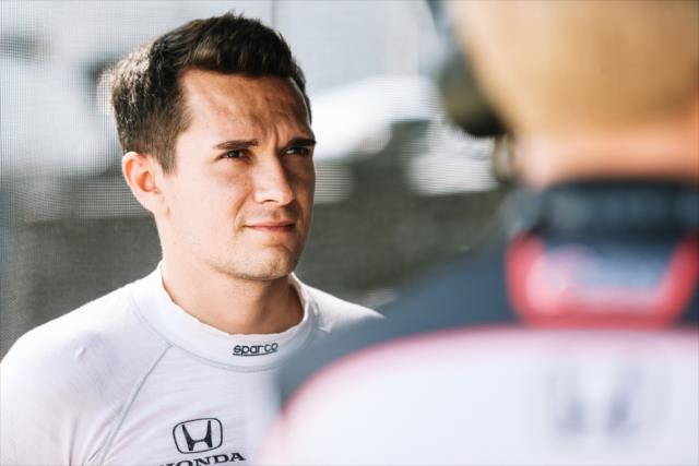 Mikhail Aleshin chats with his engineers prior to qualifications for the Honda Indy Grand Prix of Alabama -- Photo by: Joe Skibinski