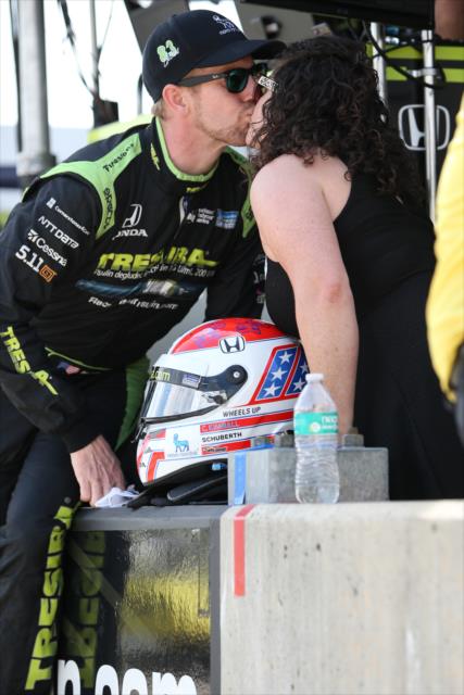 Charlie Kimball with a good-luck kiss from his wife, Kathleen, prior to qualifications for the Honda Indy Grand Prix of Alabama -- Photo by: Joe Skibinski