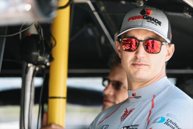 Graham Rahal looks on from his pit stand prior to qualifications for the Honda Indy Grand Prix of Alabama -- Photo by: Joe Skibinski