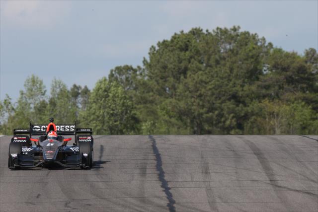 James Hinchcliffe crests the hill entering the Turn 5-6 hairpin during qualifications for the Honda Indy Grand Prix of Alabama -- Photo by: Joe Skibinski