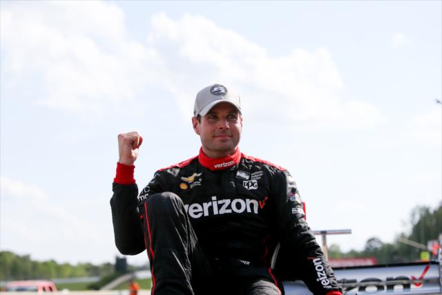 Will Power begins the celebration as he claims the pole position for the Honda Indy Grand Prix of Alabama -- Photo by: Joe Skibinski