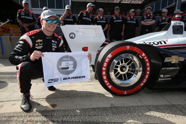 Josef Newgarden with the Verizon P1 Award flag after winning the pole position for the Honda Indy Grand Prix of Alabama -- Photo by: Chris Jones