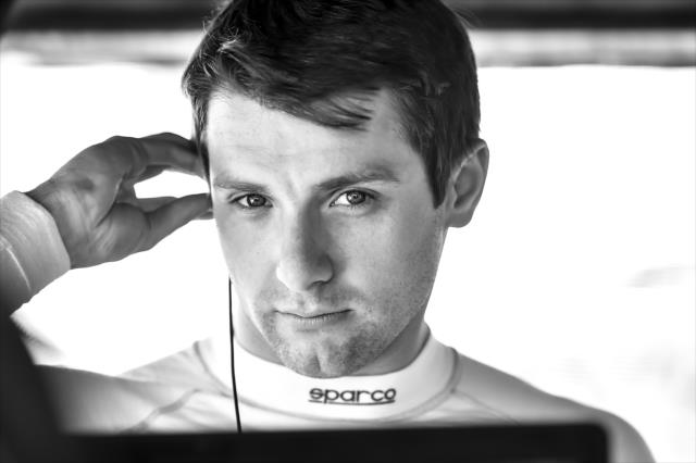 Jordan King sets his earpieces prior to qualifications for the Honda Indy Grand Prix of Alabama -- Photo by: Chris Owens