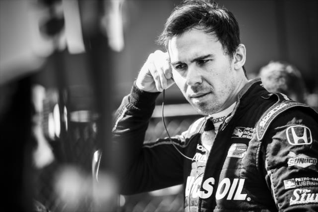 Robert Wickens sets his earpieces along pit lane prior to practice for the Honda Indy Grand Prix of Alabama -- Photo by: Chris Owens